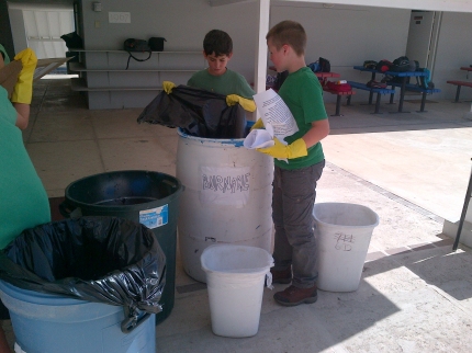 Students separate school trash